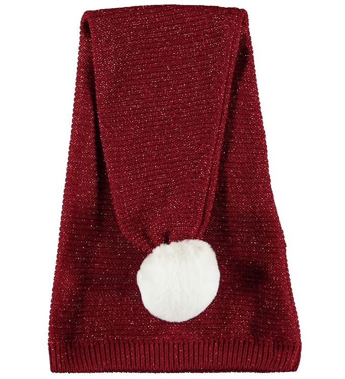 Giv dit barn et skud julestemning med Name It Nissehue med glimmer - Strik - NmnRinjaha - Red Dahlia. Denne skønne hue kombinerer funktionalitet med festligt design og er perfekt til de kolde vinterdage. Huen er fremstillet i blødt strikmateriale, der holder hovedet varmt, mens det funklende glimmer tilføjer et legende og festligt touch. Det er en ideel accessory til både julefester og hverdagens eventyr. Sørg for, at dit barn skiller sig ud med stil!

- Sæsonens must-have nissehue
- Blødt og varmt strikmateriale
- Funktionel til kolde dage
- Skinnende glimmerdetaljer
- Let at kombinere med forskellige outfits
- Velegnet til både fest og hverdag