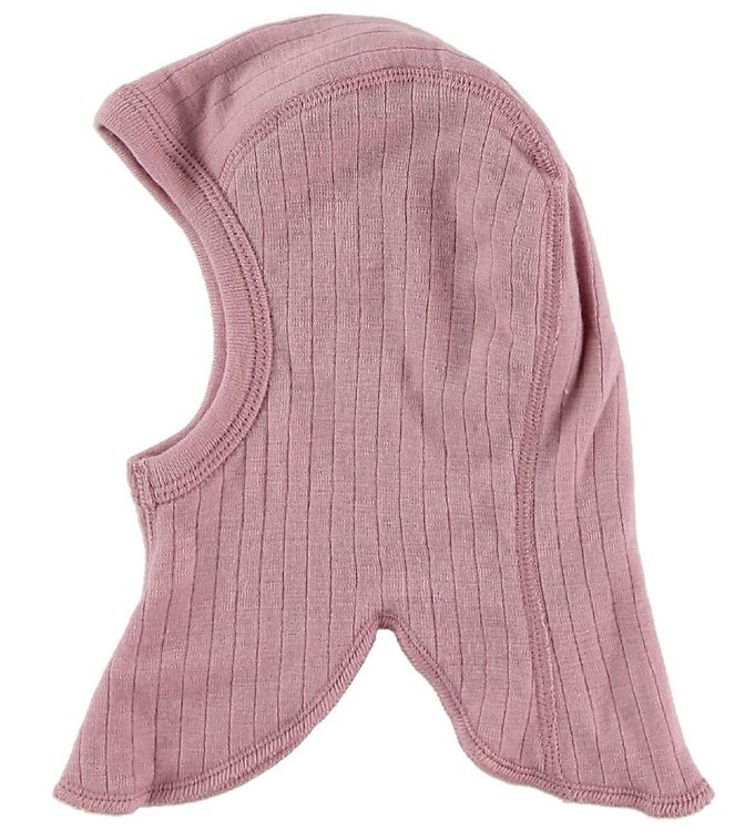Oplev Joha | Elefanthue i uld, beige - den ideelle accessory til dit barns vintergarderobe. Denne skønne elefanthue er fremstillet af 100% fin merino uld, hvilket sikrer en enestående blødhed, der er perfekt til de små. Merino ulden er naturligt temperaturregulerende og åndbar, hvilket holder dit barn varmt uden at overophede. Huen er designet med fokus på komfort og bevægelsesfrihed, så dit barn kan lege og være aktiv, mens det ser sødt ud.

**Hovedegenskaber:**
- Fremstillet af 100% blød merino uld
- Temperaturregulerende og åndbar
- Komfortabel pasform til leg og bevægelse
- Lækkert og tidløst design i beige
- Velegnet til både drenge og piger
- Ideel til kolde dage og udendørs aktiviteter